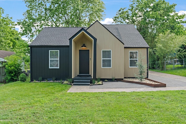 view of front of house with roof with shingles