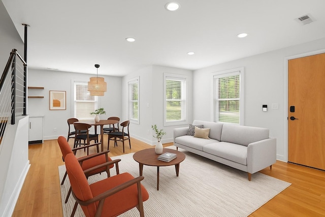 1021 Horseshoe Dr, Nashville, TN 37216 - living room with light wood-type flooring, healthy amount of natural light, recessed lighting, and stairway