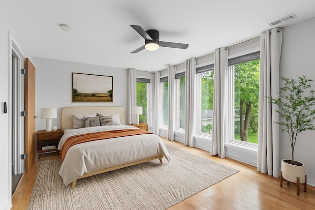 1021 Horseshoe Dr, Nashville, TN 37216 - bedroom with multiple windows, light wood finished floors, and ceiling fan