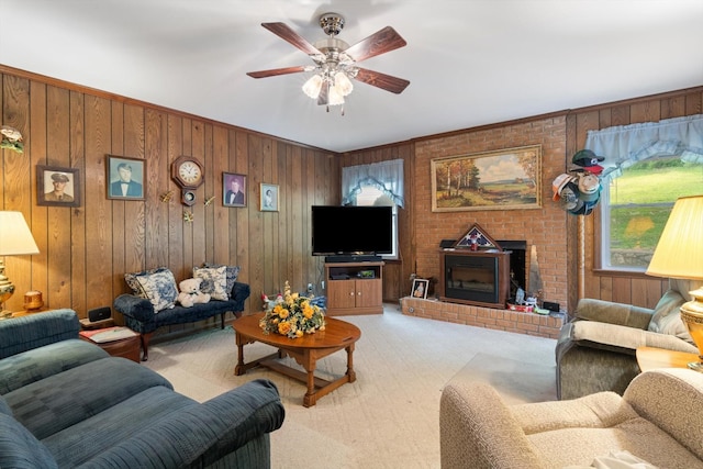 1326 Holly Tree Gap Rd, Brentwood, TN 37027 - living room with light carpet, ceiling fan, wooden walls, and a fireplace