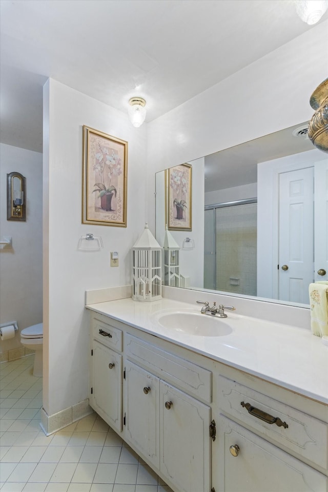 1326 Holly Tree Gap Rd, Brentwood, TN 37027 - full bathroom with tile patterned flooring, a shower stall, vanity, toilet, and baseboards