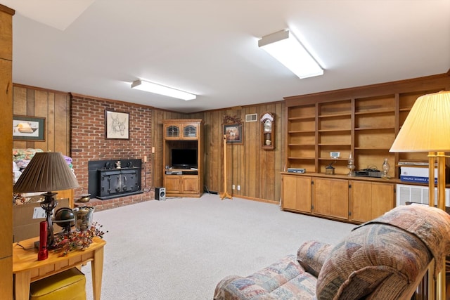 1326 Holly Tree Gap Rd, Brentwood, TN 37027 - living room featuring wooden walls, light carpet, and a fireplace
