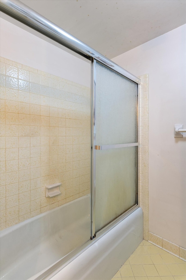 1326 Holly Tree Gap Rd, Brentwood, TN 37027 - full bathroom featuring combined bath / shower with glass door, tile patterned flooring, and baseboards