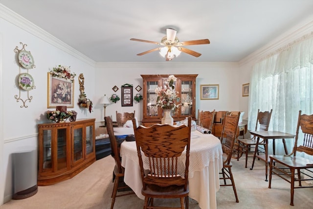 1326 Holly Tree Gap Rd, Brentwood, TN 37027 - dining area with light carpet, ceiling fan, and ornamental molding