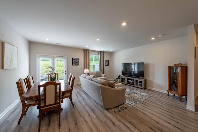 3021 Duvall Dr, Gallatin, TN 37066 - living room featuring wood finished floors, baseboards, and recessed lighting
