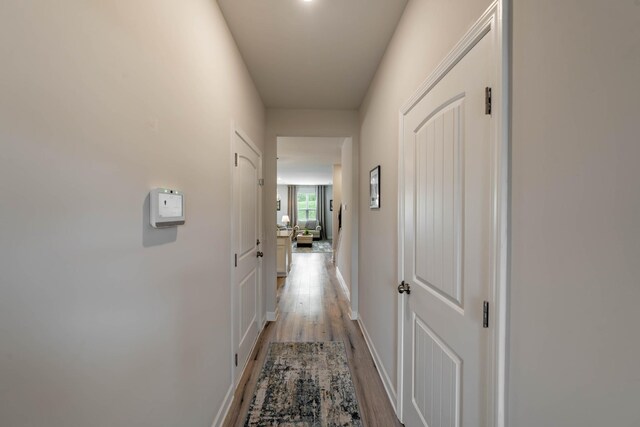 3021 Duvall Dr, Gallatin, TN 37066 - hallway with light wood-style flooring and baseboards