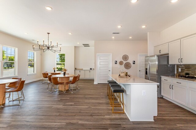 2617 Leawood Ct, Murfreesboro, TN 37128 - kitchen featuring a chandelier, backsplash, a center island, recessed lighting, and white cabinetry