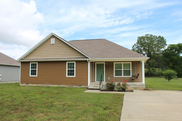 430 Gobble St, Lawrenceburg, TN 38464 - view of front facade with a shingled roof and a front lawn