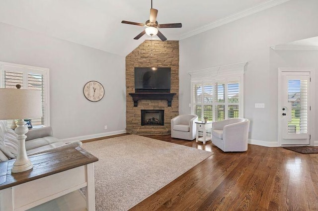 503 Carriage Ln, Lebanon, TN 37087 - living room with a stone fireplace, ceiling fan, wood finished floors, crown molding, and baseboards