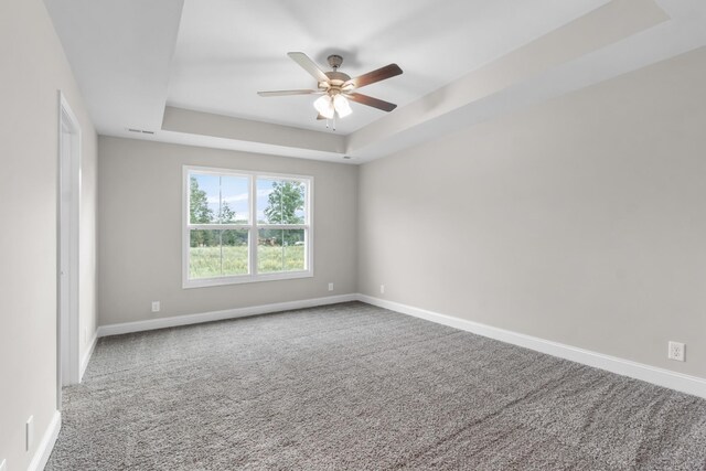 373 Galway Dr, Clarksville, TN 37042 - carpeted spare room with a tray ceiling, a ceiling fan, and baseboards