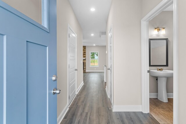 373 Galway Dr, Clarksville, TN 37042 - hall featuring dark wood-style flooring, baseboards, and recessed lighting
