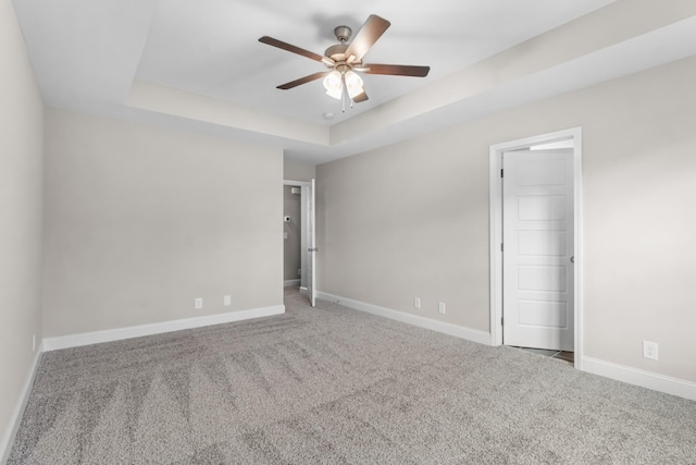 373 Galway Dr, Clarksville, TN 37042 - carpeted spare room featuring ceiling fan, a raised ceiling, and baseboards