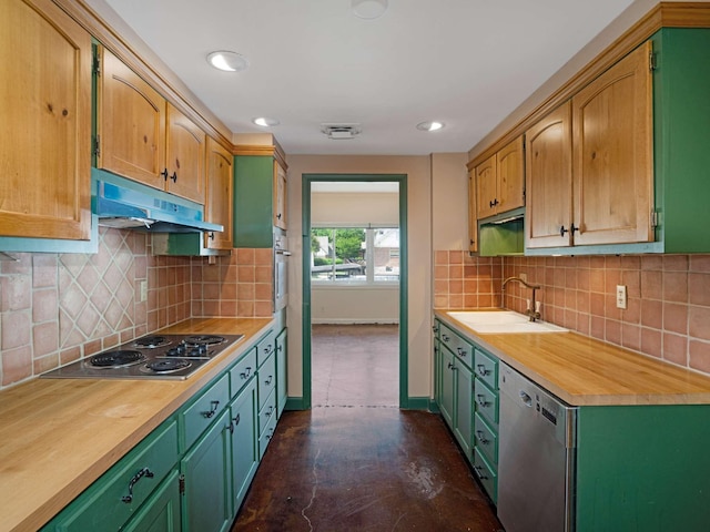 4200 W End Ave Unit 203, Nashville, TN 37205 - kitchen with appliances with stainless steel finishes, a sink, under cabinet range hood, backsplash, and baseboards