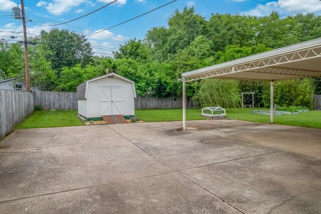 3008 Mcintire Dr, Columbia, TN 38401 - view of patio / terrace featuring a storage shed, an outdoor structure, and a carport