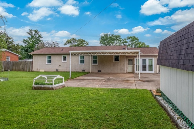 3008 Mcintire Dr, Columbia, TN 38401 - rear view of property with a patio, a garden, crawl space, and brick siding