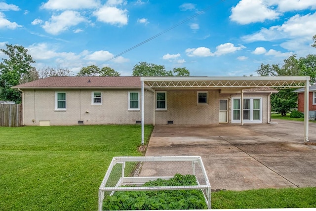 3008 Mcintire Dr, Columbia, TN 38401 - rear view of property with crawl space, brick siding, a patio area, and a carport