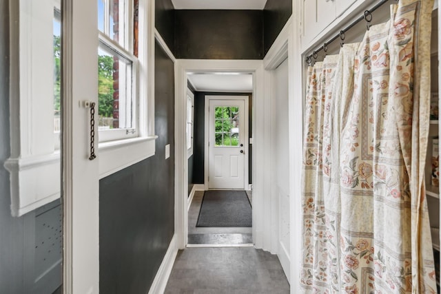 doorway with baseboards