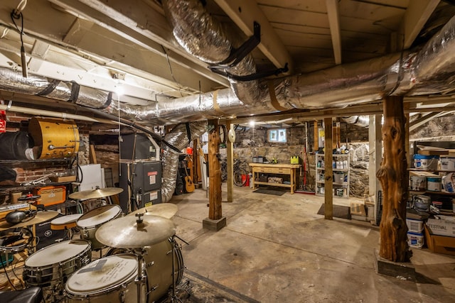 unfinished basement with heating unit