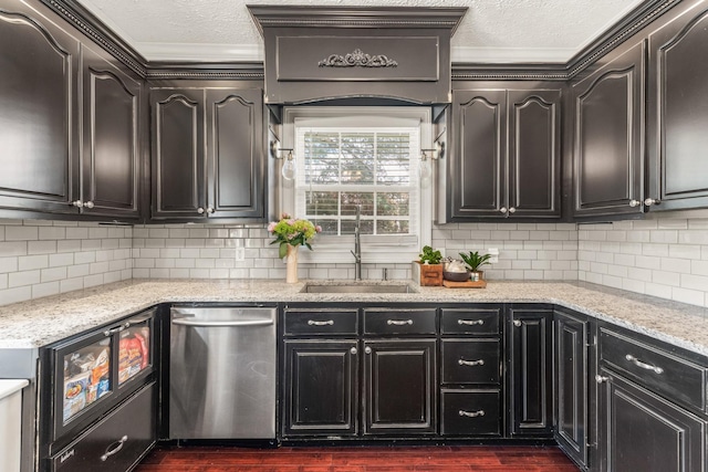 813 Swanson Blvd, Fayetteville, TN 37334 - kitchen with a sink, dishwasher, crown molding, a textured ceiling, and light stone counters