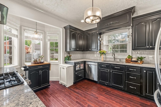 813 Swanson Blvd, Fayetteville, TN 37334 - kitchen featuring dishwasher, a sink, a textured ceiling, crown molding, and tasteful backsplash