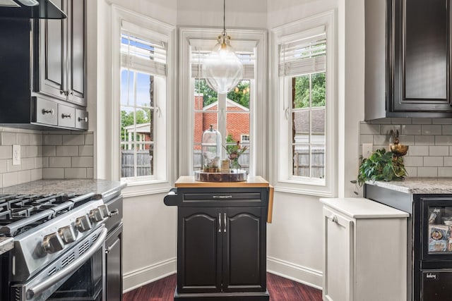 813 Swanson Blvd, Fayetteville, TN 37334 - kitchen with baseboards, stainless steel range with gas stovetop, and dark wood finished floors