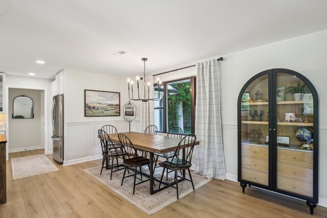 4151 Sadlersville Rd, Adams, TN 37010 - dining area featuring a chandelier, light wood-type flooring, recessed lighting, and baseboards