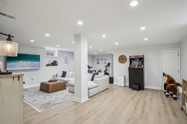 4151 Sadlersville Rd, Adams, TN 37010 - living room with light wood-type flooring, baseboards, and recessed lighting