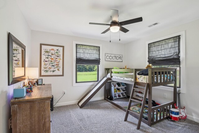 4151 Sadlersville Rd, Adams, TN 37010 - carpeted bedroom featuring baseboards and ceiling fan