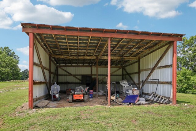 4151 Sadlersville Rd, Adams, TN 37010 - view of pole building with a lawn and a carport