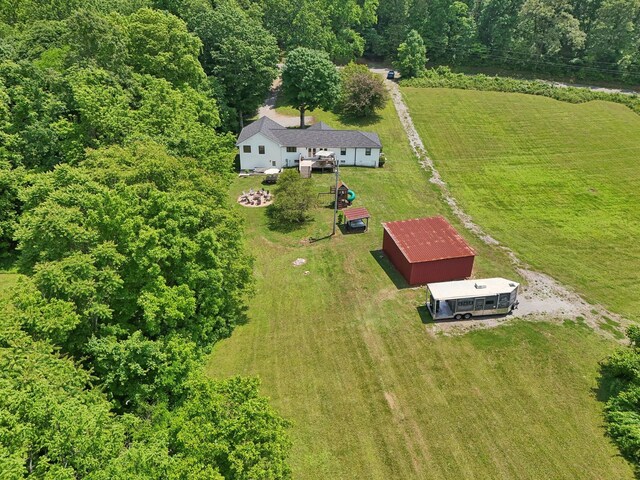 4151 Sadlersville Rd, Adams, TN 37010 - aerial view of property and surrounding area with a heavily wooded area