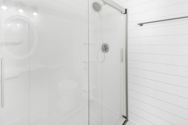 bathroom featuring a stall shower
