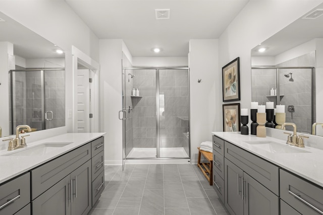 4716 Cresto Loop, Murfreesboro, TN 37128 - full bath featuring a shower stall, tile patterned floors, recessed lighting, and two vanities