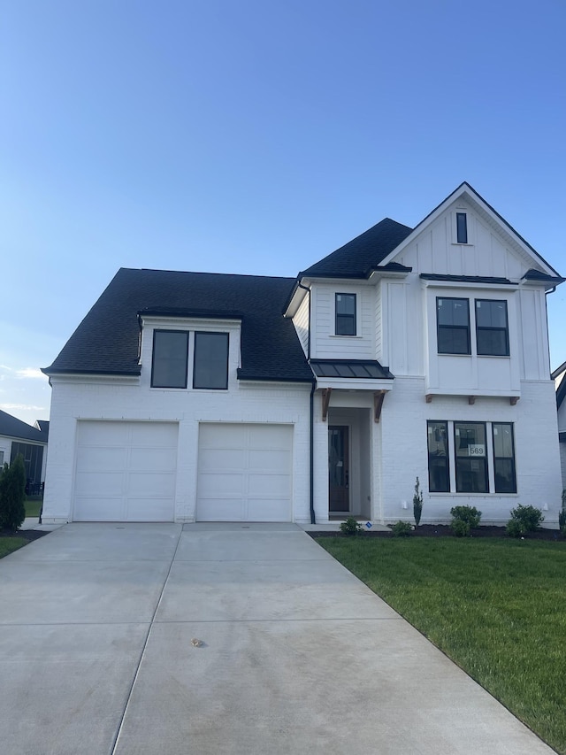 5742 Sagebrush Dr, Murfreesboro, TN 37129 - modern inspired farmhouse featuring concrete driveway, a front yard, board and batten siding, and a shingled roof