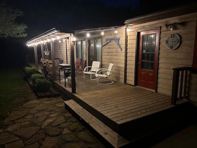 view of deck at night