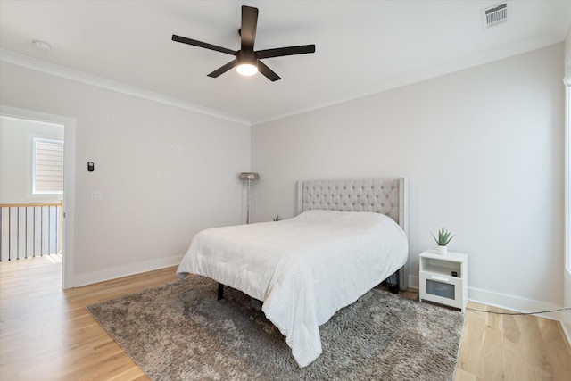 1541 Battlefield Dr Unit A, Nashville, TN 37215 - bedroom featuring light wood-style floors, crown molding, baseboards, and a ceiling fan