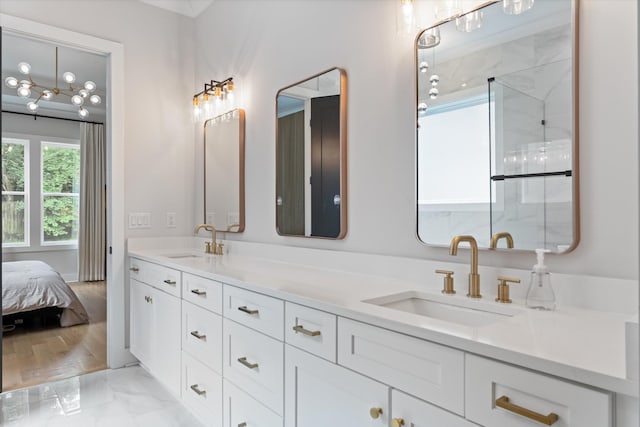 1541 Battlefield Dr Unit A, Nashville, TN 37215 - ensuite bathroom with double vanity, marble look tiles, and a shower with door