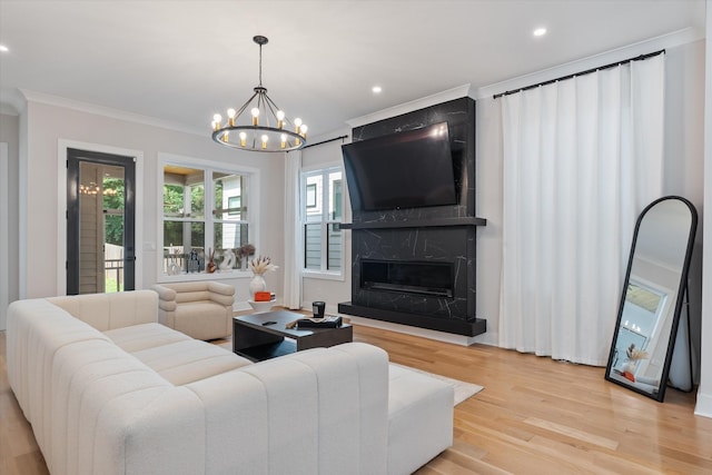 1541 Battlefield Dr Unit A, Nashville, TN 37215 - living area featuring crown molding, light wood-style flooring, a chandelier, a premium fireplace, and recessed lighting