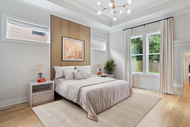 1541 Battlefield Dr Unit A, Nashville, TN 37215 - bedroom with a tray ceiling, a chandelier, light wood-style flooring, and baseboards