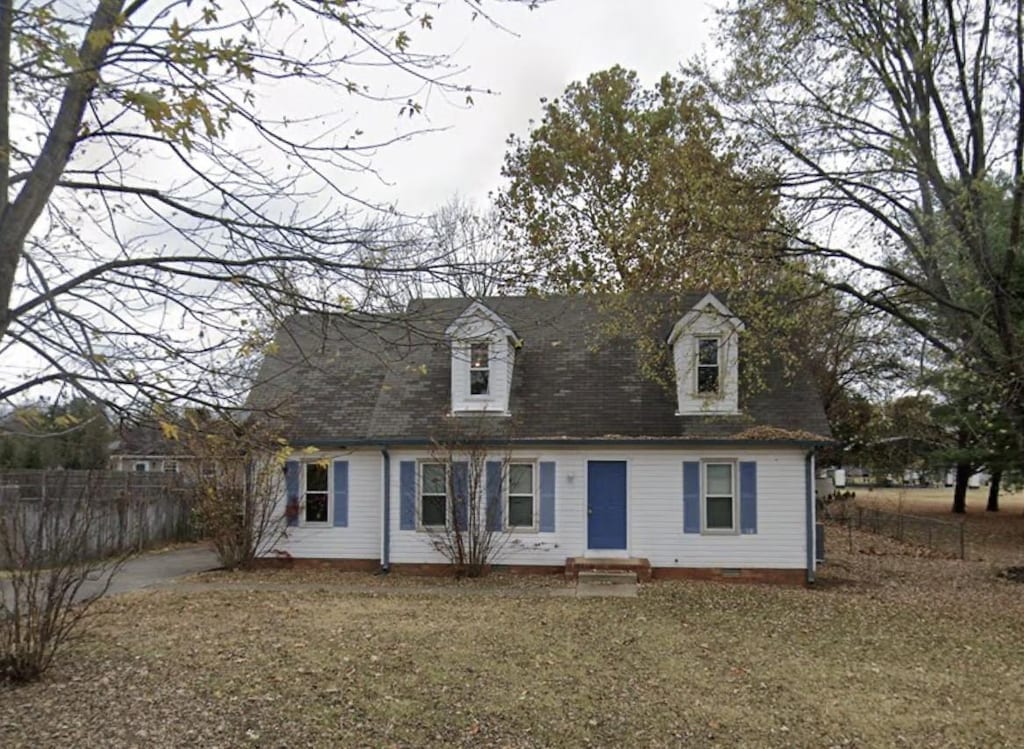 view of front of property with fence