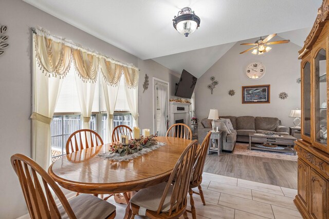 1172 Country Fields Ln, Clarksville, TN 37040 - dining area with ceiling fan, a fireplace, and lofted ceiling