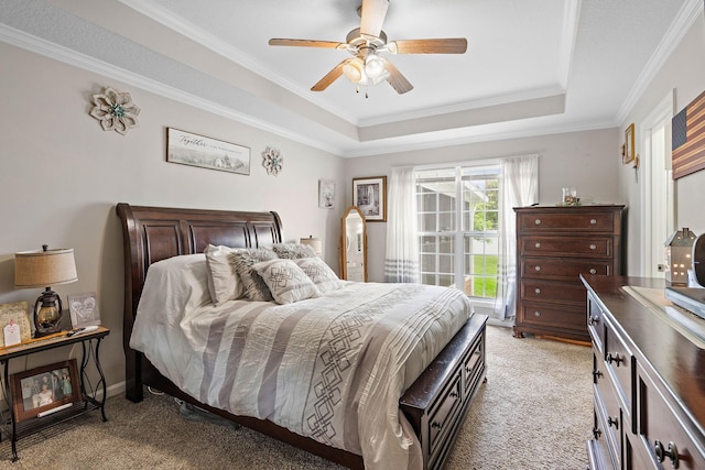 1172 Country Fields Ln, Clarksville, TN 37040 - bedroom featuring light carpet, a tray ceiling, ornamental molding, and a ceiling fan