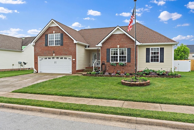 1172 Country Fields Ln, Clarksville, TN 37040 - traditional home with an attached garage, driveway, and brick siding