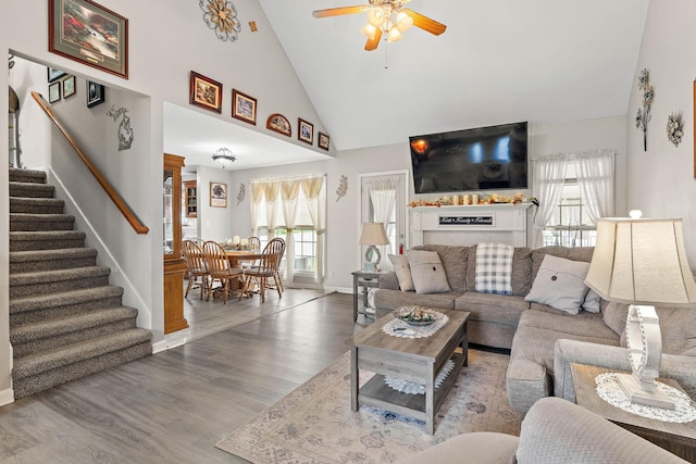 1172 Country Fields Ln, Clarksville, TN 37040 - living area with a ceiling fan, wood finished floors, stairs, healthy amount of natural light, and high vaulted ceiling