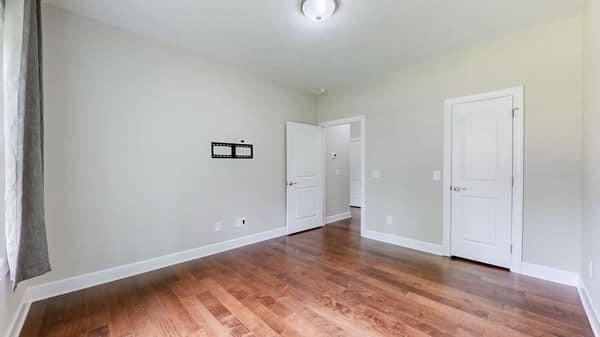 683 Northup Rd, Portland, TN 37148 - unfurnished bedroom with wood finished floors and baseboards