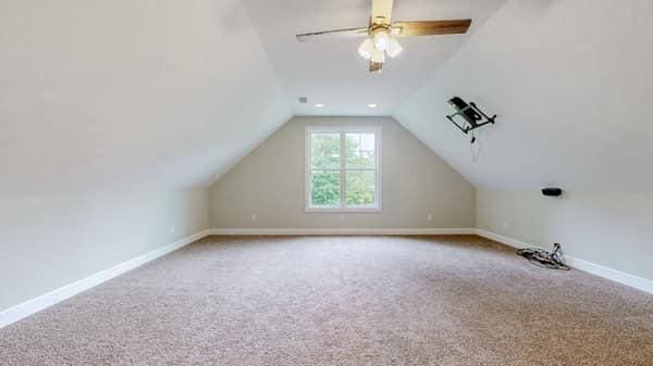 683 Northup Rd, Portland, TN 37148 - additional living space featuring carpet, vaulted ceiling, baseboards, and a ceiling fan