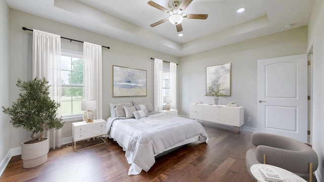 683 Northup Rd, Portland, TN 37148 - bedroom featuring a raised ceiling, dark wood finished floors, baseboards, recessed lighting, and ceiling fan