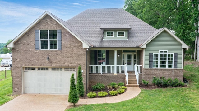 683 Northup Rd, Portland, TN 37148 - view of front of property with a porch, brick siding, an attached garage, and concrete driveway