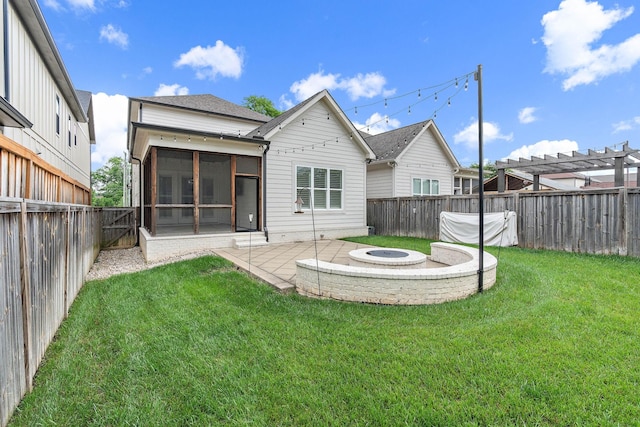 1501 Woodmont Blvd Unit B, Nashville, TN 37215 - rear view of property featuring a sunroom, a patio, an outdoor fire pit, and a shingled roof