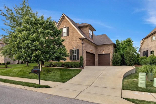 6018 Trotwood Ln, Spring Hill, TN 37174 - traditional home featuring brick siding, a front lawn, concrete driveway, a garage, and a shingled roof