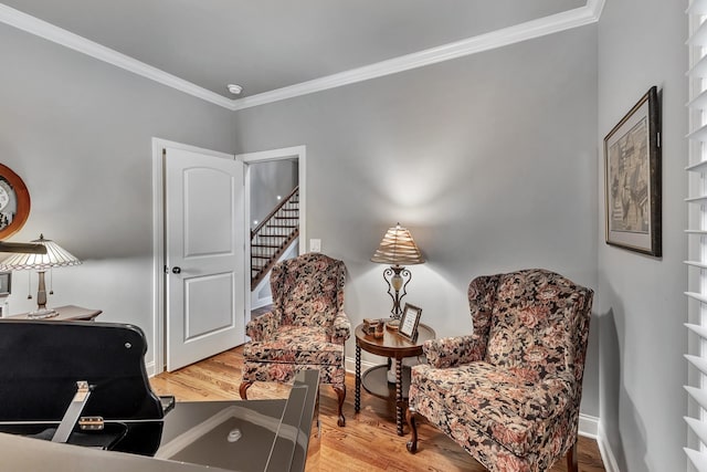 6018 Trotwood Ln, Spring Hill, TN 37174 - sitting room featuring wood finished floors, crown molding, and a desk